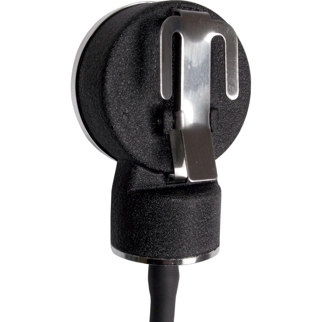 Close-up of a black aneroid sphygmomanometer gauge face